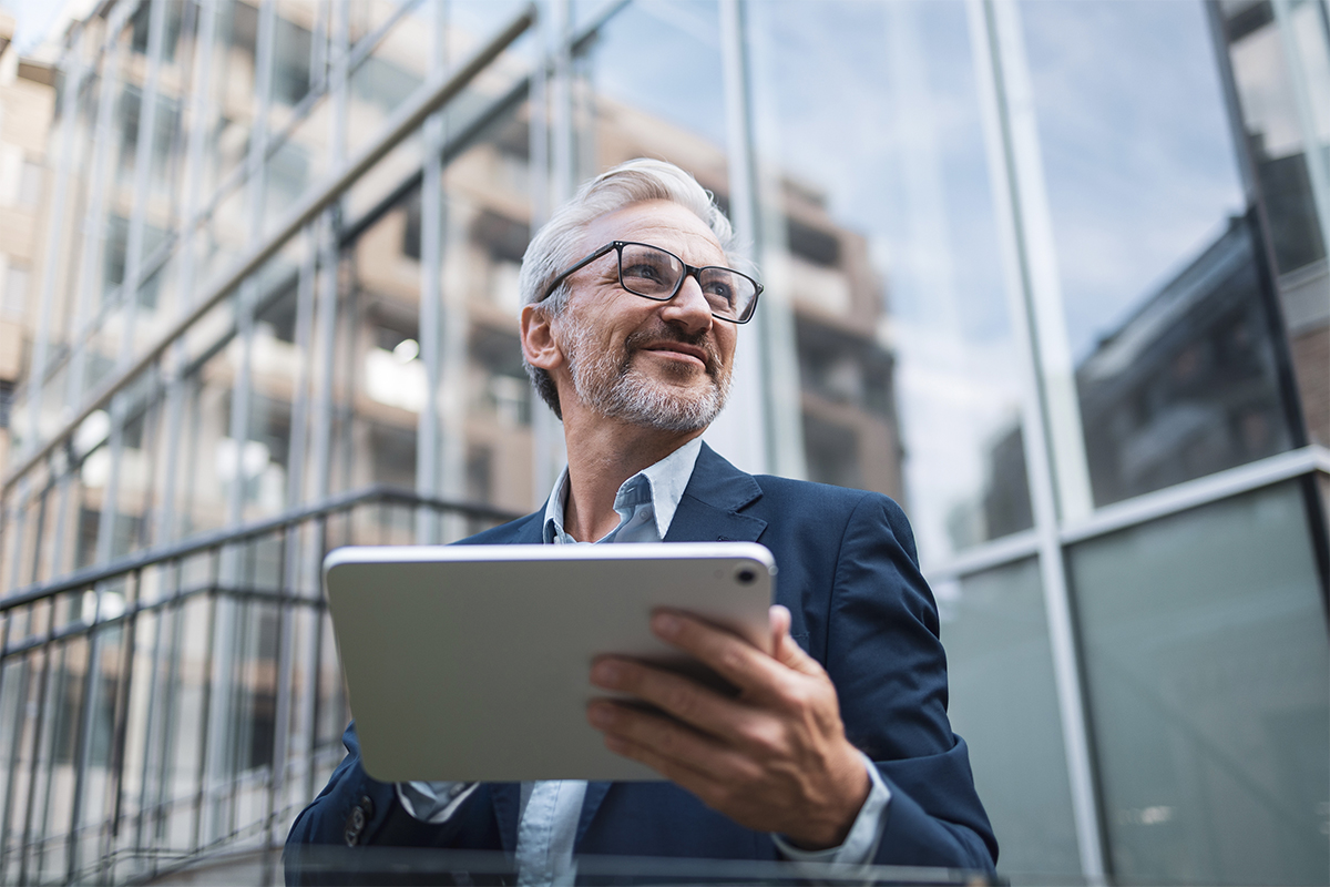 Man looking at iPad